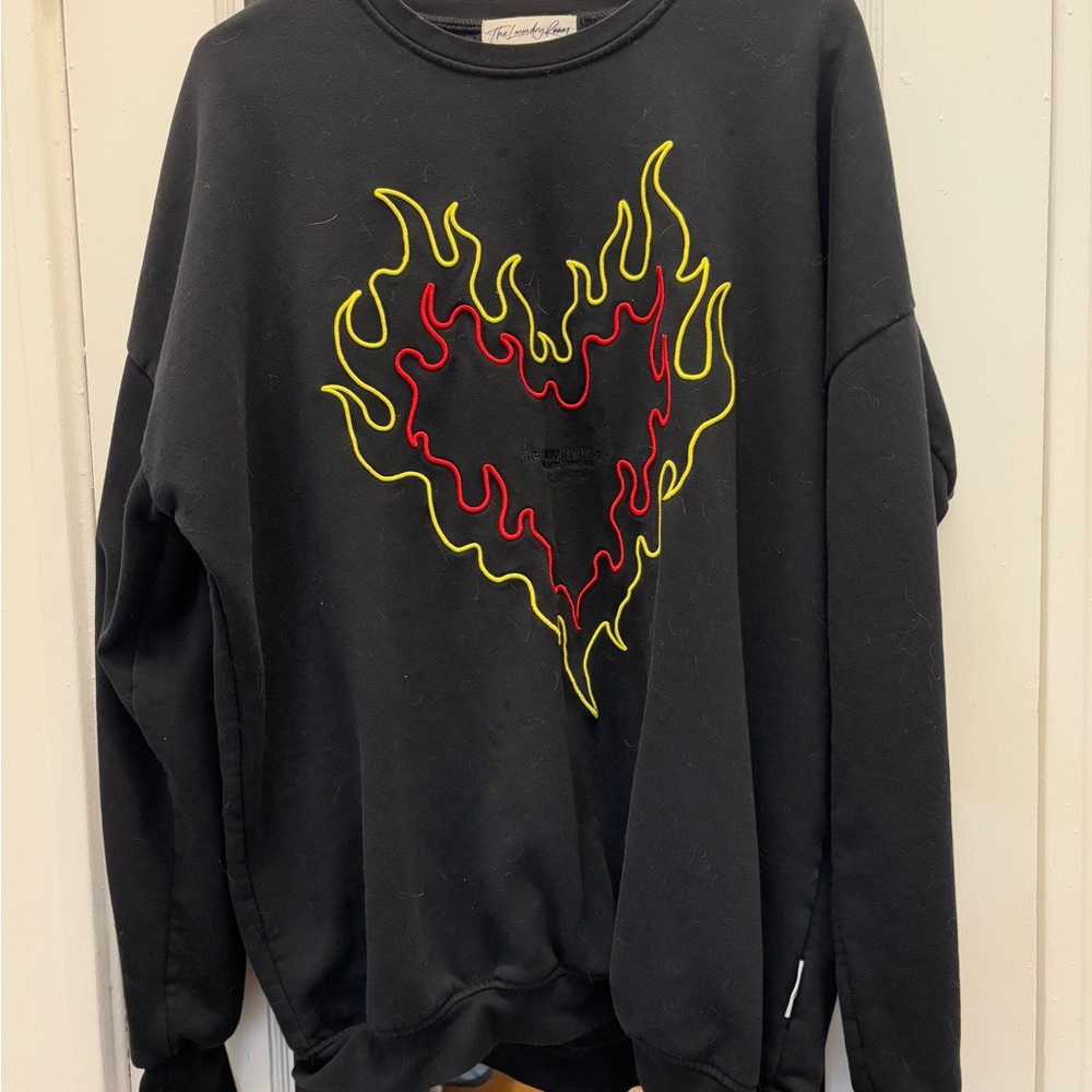 The Laundry Room Black Sweatshirt with Red and Yellow Flame Heart